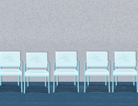 Chairs Lined Up In An Empty Waiting Room Or Office