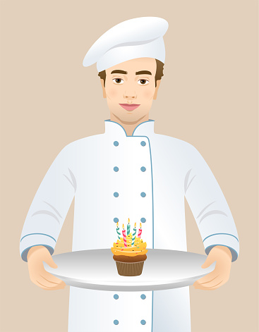 Chef holding a plate with a birthday cupcake