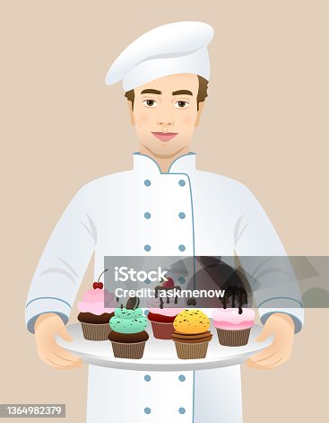 istock Chef holding a plate with cupcakes 1364982379