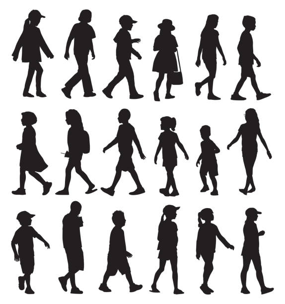 Children Walking Silhouette Set Vector silhouettes of eighteen different children walking. child silhouettes stock illustrations