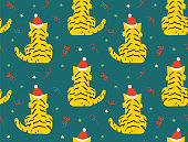 Christmas and new year holiday seamless pattern with tigers, confetti and stars. Vector colorful background. Year of the tiger. Chinese new year