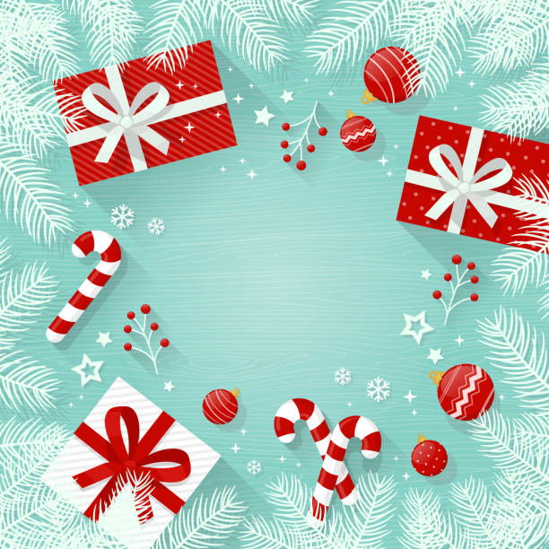 рождественский фон с украшениями и подарочными коробками, белыми ветвями ели на деревянном столе - christmas table stock illustrations