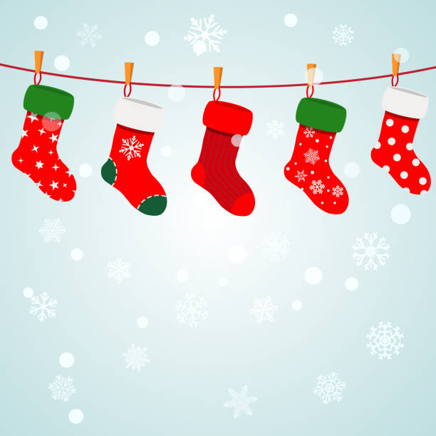 Christmas background with socks hanging on a rope Christmas background with snowflakes and socks hanging on a rope. Vector illustrations. EPS10, JPG and AI10 are available christmas stocking stock illustrations