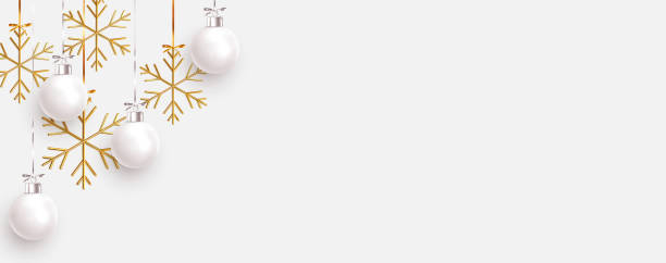 Christmas balls background. Hanging white Xmas decorative bauble, 3d golden metallic snowflakes on the ribbon. Festive vector realistic decor ornaments Christmas balls background. Hanging white Xmas decorative bauble, 3d golden metallic snowflakes on the ribbon. Festive vector realistic decor ornaments gold ornaments stock illustrations