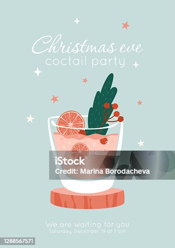 istock Christmas eve cocktail party invitation concept. Glass of pink drink with orange, berries branch and pine leaf decor. 1288567571