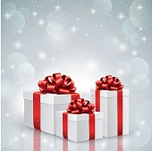 Christmas gift with red ribbon. Eps-10 file with transparencies and gradient meshes. Hi-Res JPG included.