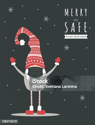 istock Christmas gnome wearing a protective face mask against coronavirus. New year greeting card with quote Merry and Safe. 1282776721