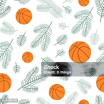 istock Christmas seamless background with basketball balls and fir shawls. 1269794770