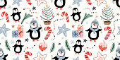 istock Christmas seamless pattern with penguins and seasonal elements, winter background 1346220703