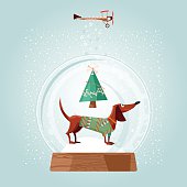 Christmas snow globe and dachshund. Christmas dog. Greeting card. Vector illustration.