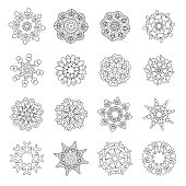 Christmas doodles. Snowflakes, Fractals or Mandala icons. Freehand sketch for adult coloring book page.