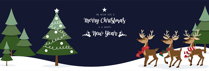 Christmas tree decorate with Christmas balls and star in pine tree forest on snow hill with a group of reindeer on dark sky with we wish you a Merry Christmas and a Happy New Year text design for banner, frame, header, background for greeting card design.