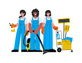 istock Cleaning service team,three women.Caucasian,african-american charwomen in uniform.Vector illustration. 1322190911