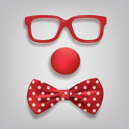 Clown accessories isolated on gray background. Vector clown glasses, nose and bow tie polka dot.