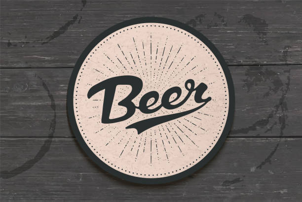 Coaster for beer with hand drawn lettering Beer Coaster for beer with hand drawn lettering Beer. Monochrome vintage drawing for bar, pub and beer themes. Black coaster for placing a beer mug or a bottle over it with lettering. Vector Illustration coaster stock illustrations