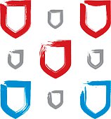 Collection of brush drawing vector security signs, set of blue and red hand-painted simple shield icons, protection symbols isolated on white background. User interface pictograms, created with real hand-drawn ink brush scanned and vectorized.