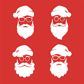 Collection of four vector hipster style Santa Claus silhouettes.