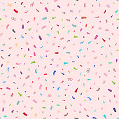 Colorful confetti on pink background. Cute festive seamless pattern. Endless vector illustration.