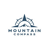 Compass with mountain logo design