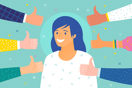 Concept of success. Cheerful young woman surrounded by hands with thumbs up.