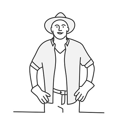 Confident man in hat holds hands on hips.