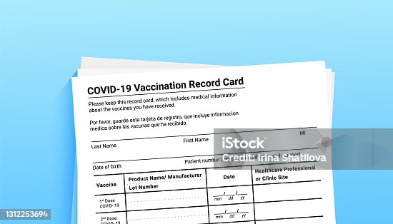 istock Coronavirus vaccination record card on blue background with copy space for travel and movement without borders. Vaccination form during the coronavirus covid 19 epidemic 1312253694