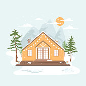 istock Cozy house in winter forest. Weekend, vacation on nature, snowy landscape with hills on background. 1353572839