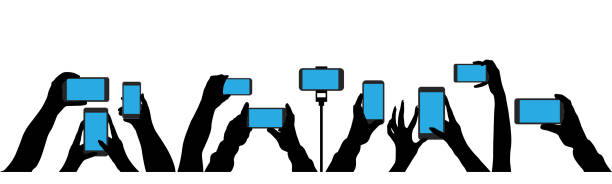 Crowd of people shoot the event on a smartphone. In the hands of the camera shoots a video at a party concert. Isolated silhouette set vector Crowd of people shoot the event on a smartphone. In the hands of the camera shoots a video at a party concert. Isolated silhouette set vector selfie silhouettes stock illustrations