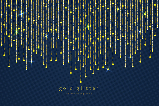 Curtain of golden particles on a blue background