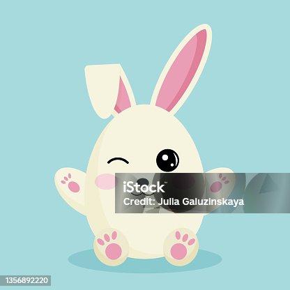 istock A cute Easter bunny in the form of the egg is winking. 1356892220