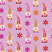 Cute Easter gnomes with bunny ears seamless pattern holding eggs and carrot with flowers on pink background . Great for easter greeting cards, gift wrapping paper and textile