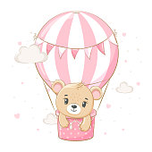 A cute teddy bear girl is flying in a balloon. Vector illustration of a cartoon.