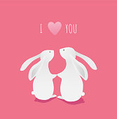 Cute white bunnies on a pink background with heart and text illustration. I love you. Valentine's day card design. - Vector
