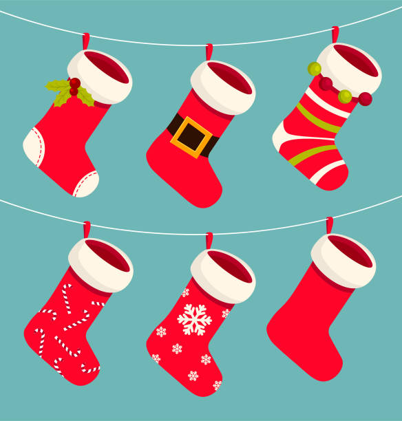 Cute Xmas red and white socks or stocking hanging on a rope. Cute Xmas red and white socks or stocking hanging on a rope. Christmas and New year holiday. Traditional decorations for gifts with pattern. Vector cartoon Illustration. christmas stocking stock illustrations