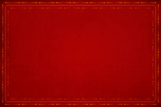 Dark red grunge Christmas Background with a pattern or design of border frame in dots and angled small dash, dashes, hatch marks. Can be used as Xmas, Diwali wallpaper, background or gift wrapping sheet, poster, template, greeting card. Merry Christmas, happy festive background. No text. No people, copy space. Grungy. Mottled, scratched, textured