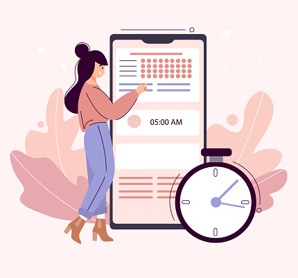 Day planning concept. Young woman standing next to a large smartphone with a tracker and to-do list on the screen. The girl takes notes in the planner app. Time organizer