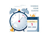 istock Daylight Saving Time ends concept. The hand of the clocks turning to winter time. Calendar with marked date, text Change your clocks. DST ends in usa, vector illustration in modern flat style design 1270707532