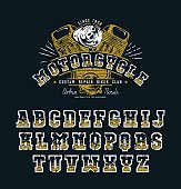 Decorative serif font in biker style. Letters with shabby texture. Graphic design for t-shirt and titles. Color print on black background