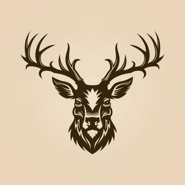 Deer head cut out silhouette. Horned elk or stag icon. Deer head cut out vector silhouette. Horned elk or stag icon. antler stock illustrations
