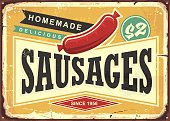 Delicious homemade sausages retro promotional sign. Vintage ad for grill restaurant or butcher shop. Food theme.
