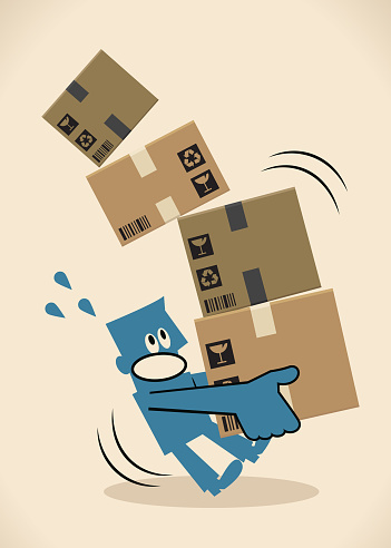 Delivery man carrying a pile of cardboard boxes, slipping and falling down