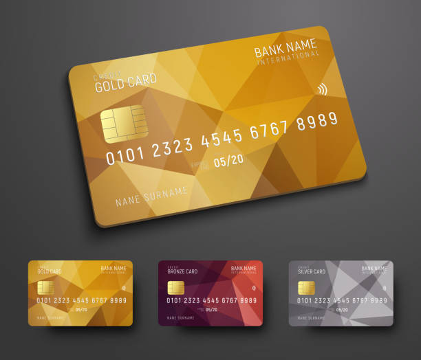 Design of a credit (debit) bank card with a gold, bronze and silver polygonal background Design of a credit (debit) bank card with a gold, bronze and silver polygonal abstract background. Template for presentation. Vector illustration credit card stock illustrations