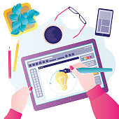 istock Designer or illustrator draws illustrations using stylus. Workplace with different tools. Tablet screen with special drawing program 1344306064