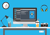 istock desk with computer and other things, vector 507532450