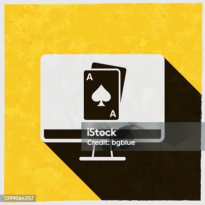 istock Desktop computer with playing card. Icon with long shadow on textured yellow background 1399064257