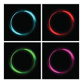 Different color fire circles on black background. Fire ring glowing trace set. Vector fire blue, red, green and pink circles.