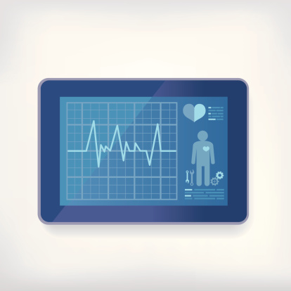 Digital tablet with heart monitor graphics displayed
