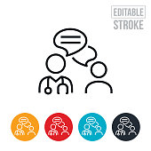 An icon of a doctor using online chat to communicate with a patient. The icon includes editable strokes or outlines using the EPS vector file.