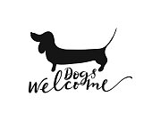 Dogs welcome lettering and dachshund silhouette. Design element for cafe, hotel and shop.