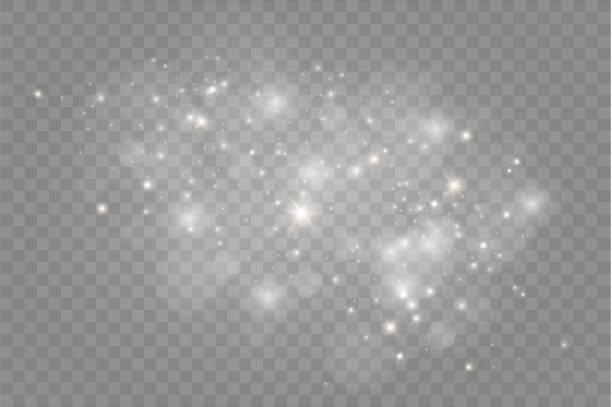 Dust on a transparent background.bright stars.The glow lighting effect Dust on a transparent background.bright stars.The glow lighting effect. vector illustration.the sun is shining. magic light effect stock illustrations